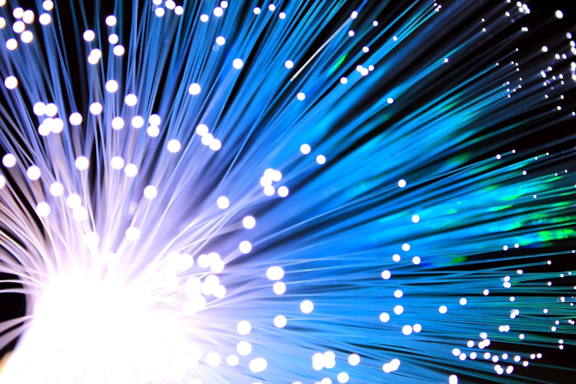 Illuminated fibre-optic strands carrying network traffic